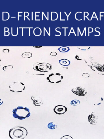 White paper with button stamp impressions in blue and black ink
