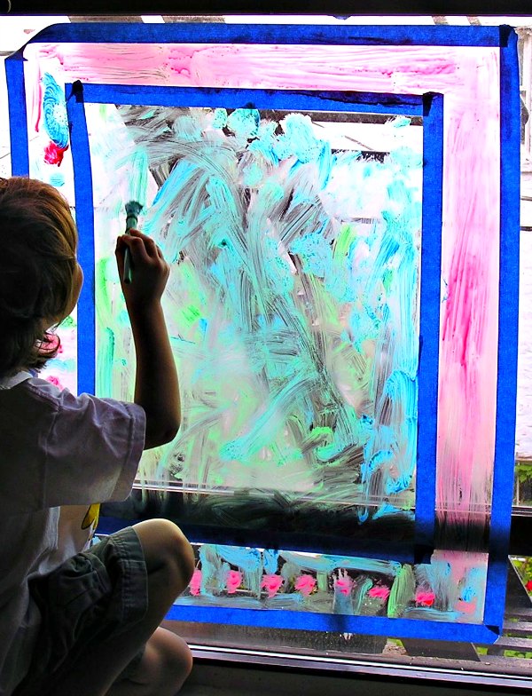 Window painting is a fun indoor activity for kids during rainy days