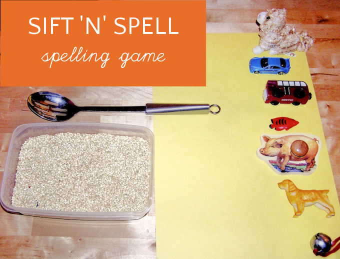 Set up for word hunt, hands on spelling activity with spoon, rice and toys