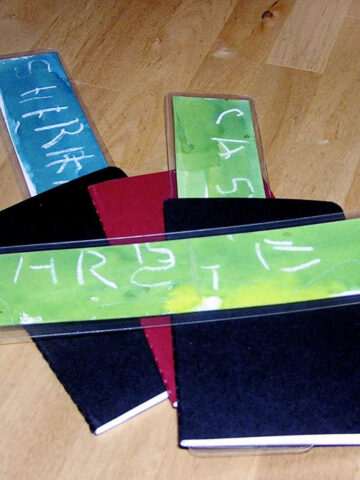 Handmade watercolor bookmarks in moleskine journals