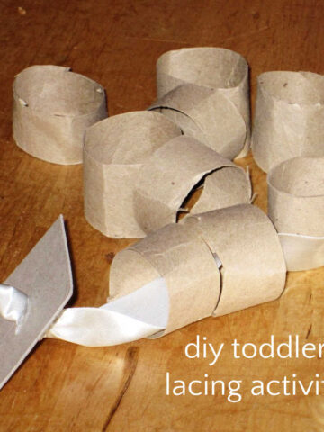 Lacing ribbon and paper rolls for toddler activity