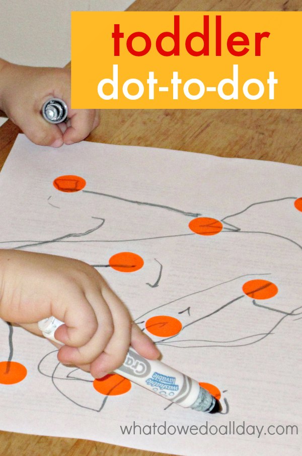 Child engaging in toddler dot to dot activity