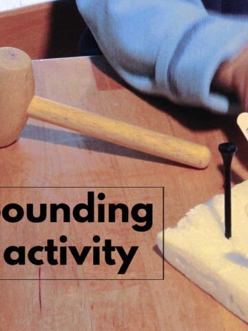 Toy wooden hammer and toddler pounding activity