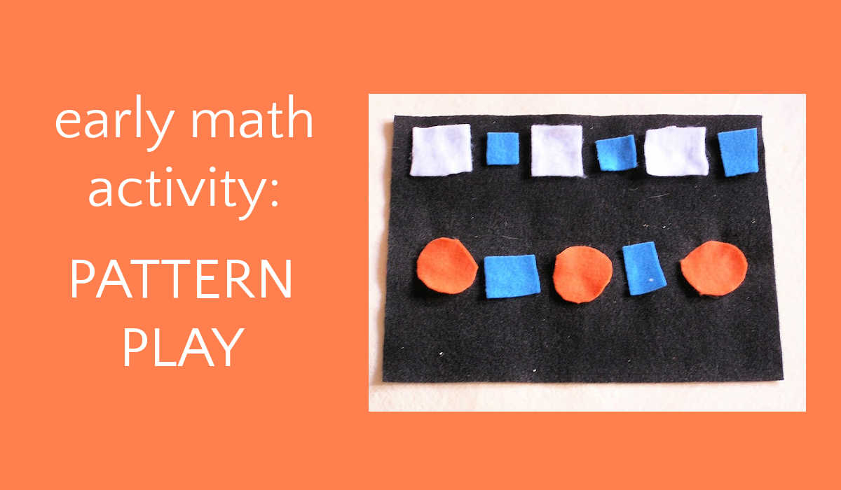 White and blue square and orange circle felt shapes on black background laid out in white square-blue square and orange circle-blue square pattern.