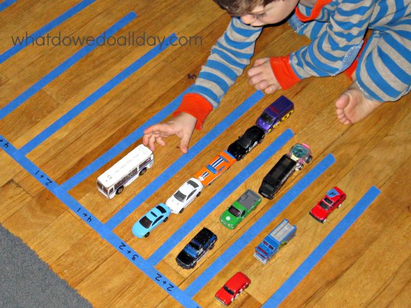 Kids who love toy cars and math will love this parking lot game.