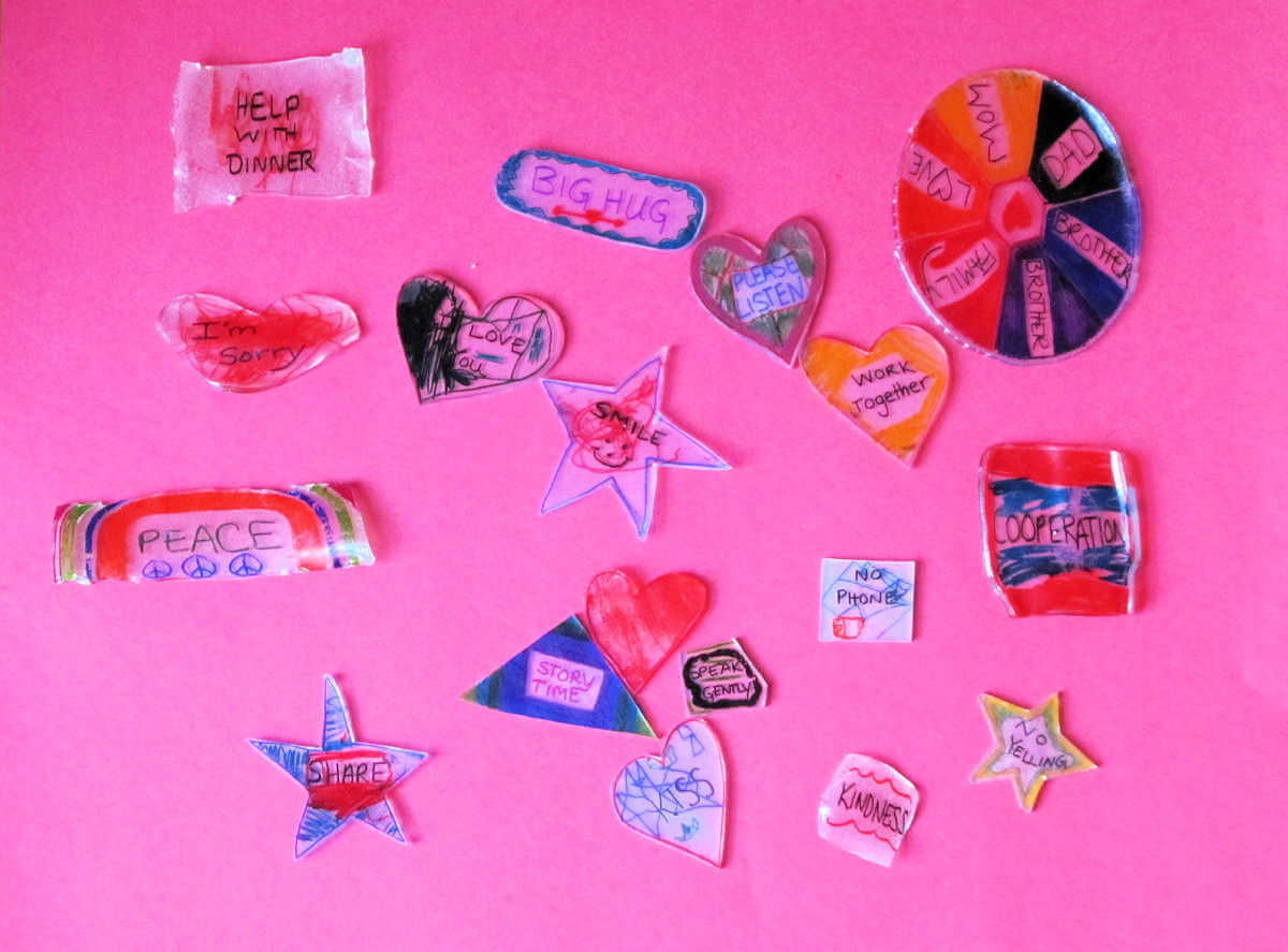 selection of homemade kindness tokens on pink background