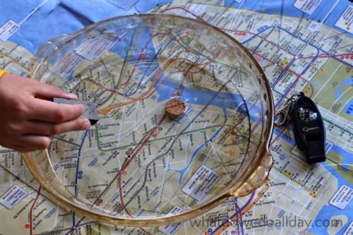 Using a homemade compass to explore map science.