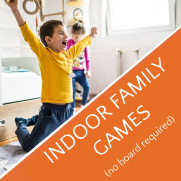 child raising arms in victory for indoor family games