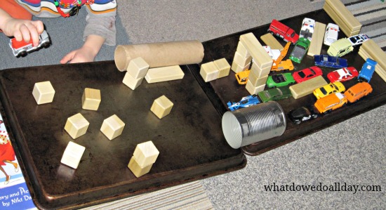 Homemade car ramp for toy cars with building block obstacle course