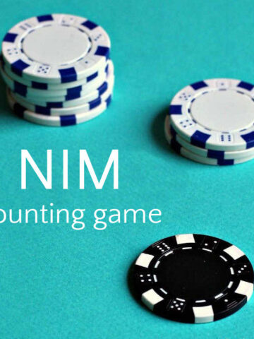 Stacks of white and black counters for playing Nim game