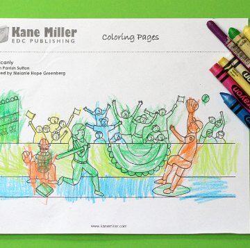 Baseball coloring page on green background with crayons
