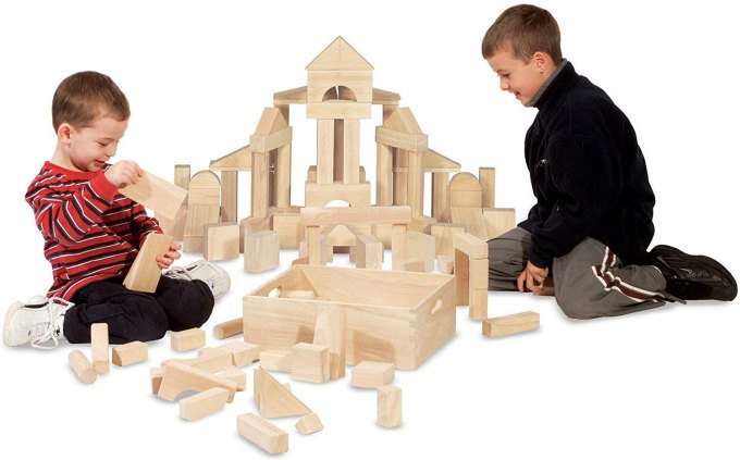 Two preschools building with plain unit blocks.