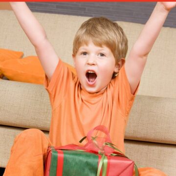 Happy child getting a gift