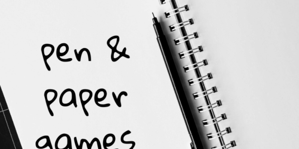 Pen and paper games written on blank page of notebook.