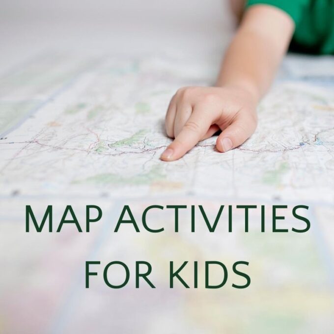 child's hand pointing to location on map