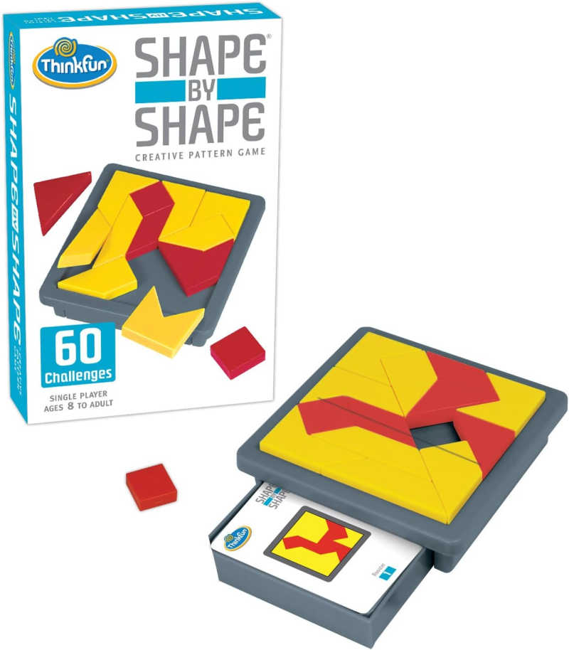 Shape by Shape tangram puzzle in box and example puzzle pieces.