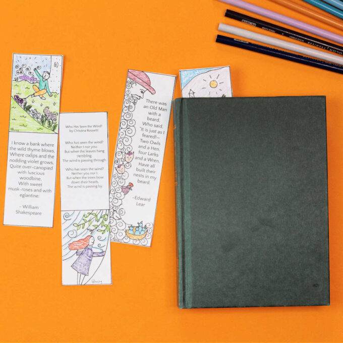 four paper poetry bookmarks with book and colored pencils