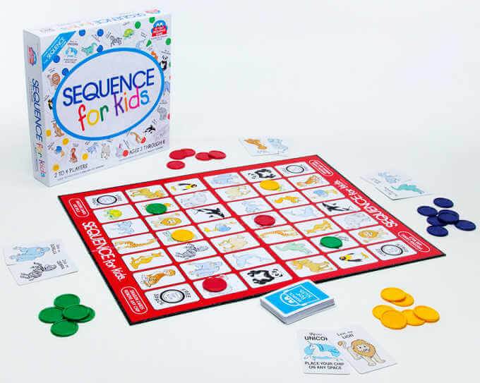 Sequence for Kids game box and board with cards and chips on white background