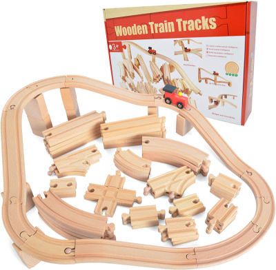 Plain wooden toy train tracks with red train car and box