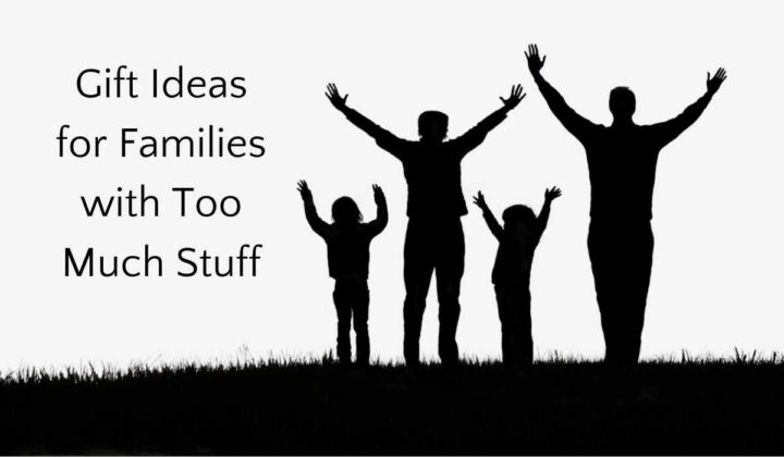 Family of four holding up arms with text that reads" gifts for families with too much stuff"