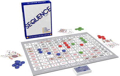 Sequence game board set up with cards, tokens and box