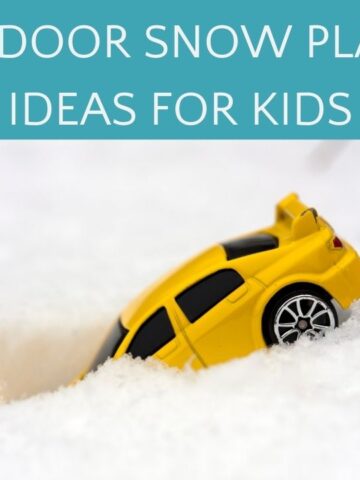 Yellow toy car stuck in the snow