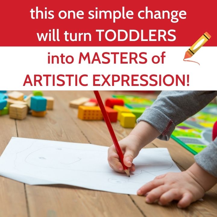 Toddler drawing with red pencil