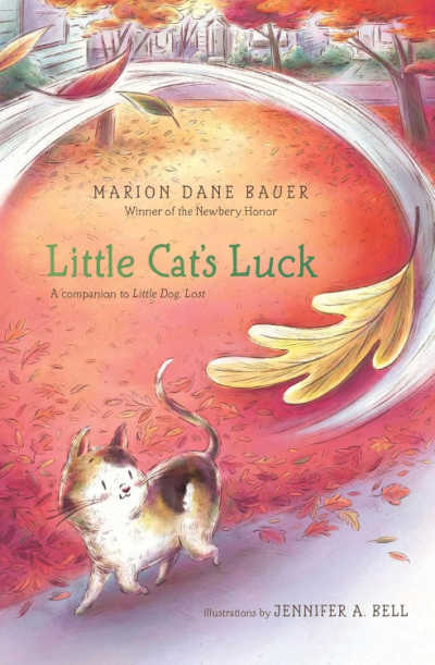 Book cover for Little Cat's Luck with illustration of calico cat walking on sidewalk in park covered in fall leaves.
