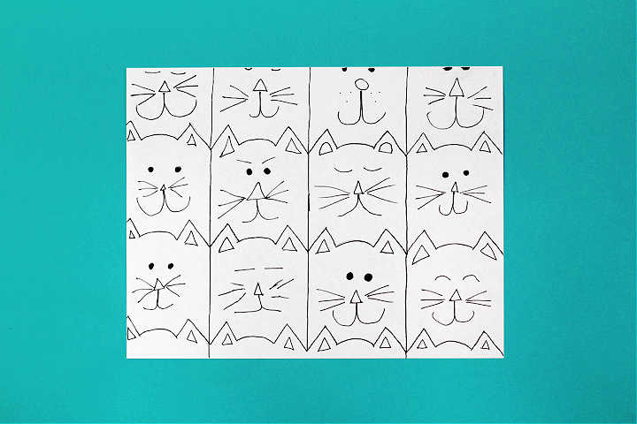 Paper filled with cat tessellation outlines and faces 