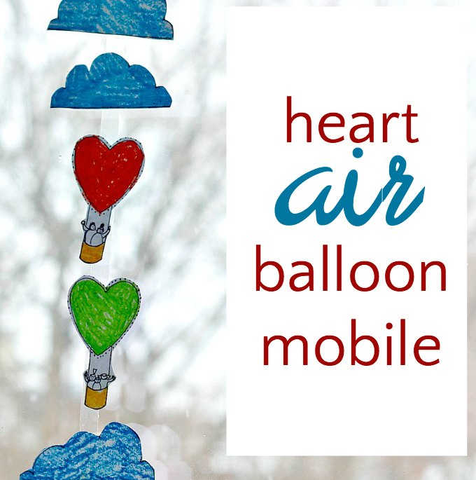 Finished heart air balloon mobile hanging in window