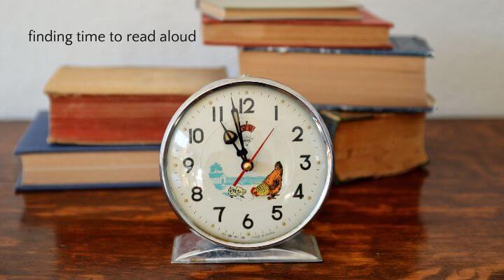 Clock with stack of old books