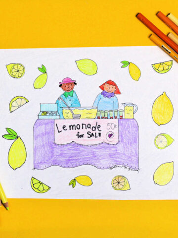 Lemonade stand coloring page and colored pencils on yellow background