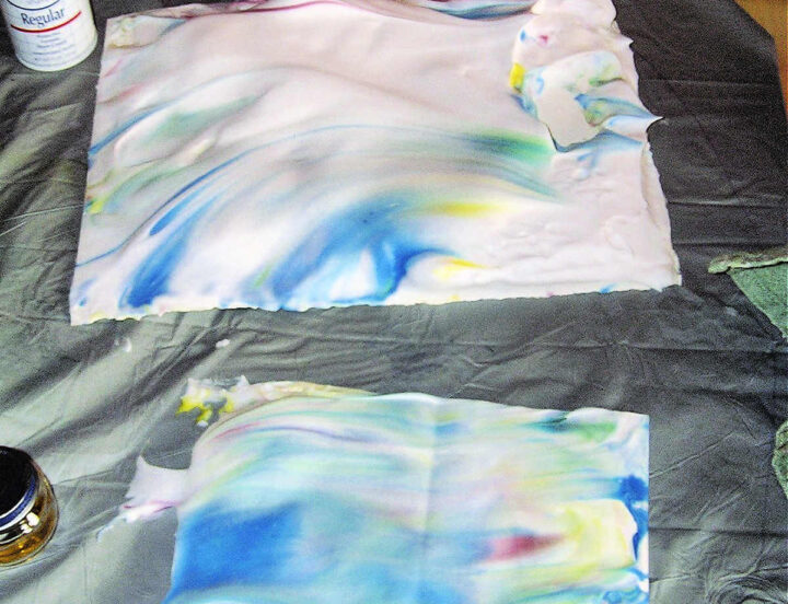 shaving cream with watercolors on top of paper