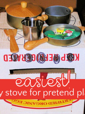 Stove and oven made from a cardboard box with toy kitchen gadgets sitting on top. Text overlay reads "easiest diy stove for pretend play."