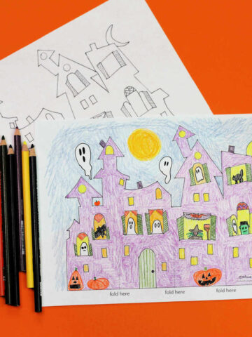Blank haunted house template, colored pencils and colored in haunted house coloring page