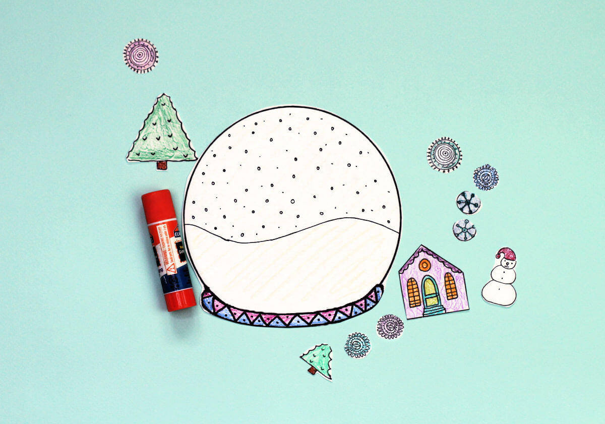 Cut out snow globe coloring page craft and glue stick.