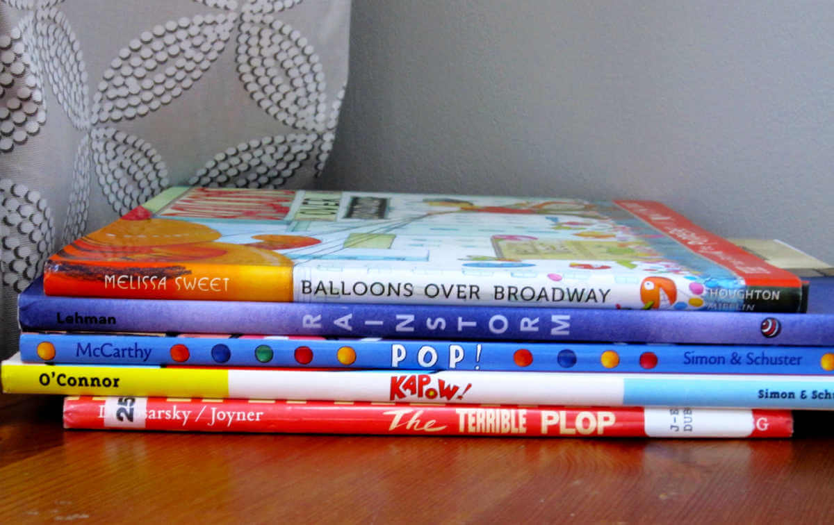 Five children's picture books in a stack to create a poem with the titles.