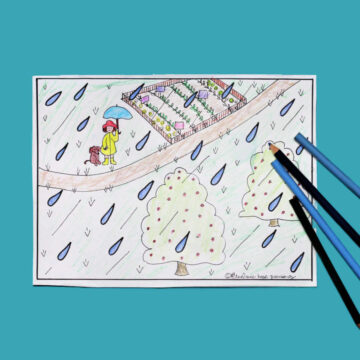 April showers coloring page with colored pencils and blue background.