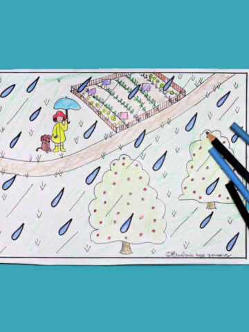April showers coloring page with colored pencils and blue background.