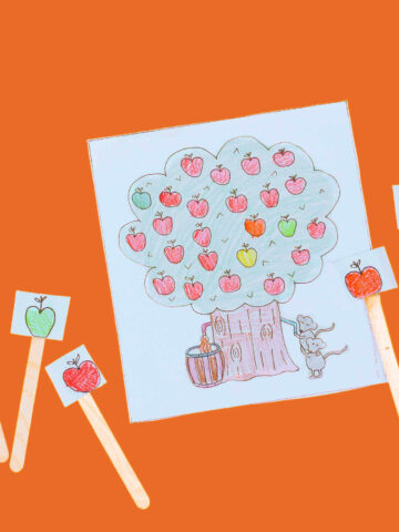 Coloring page with apple tree and two mice with cider barrel, plus five coloring page apples on wooden craft sticks.