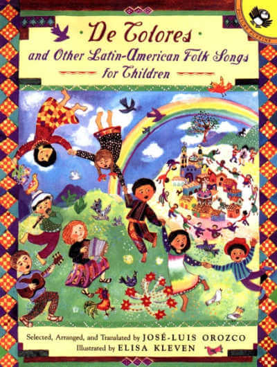De Colores book cover with illustration of children dancing, singing and playing on meadow.