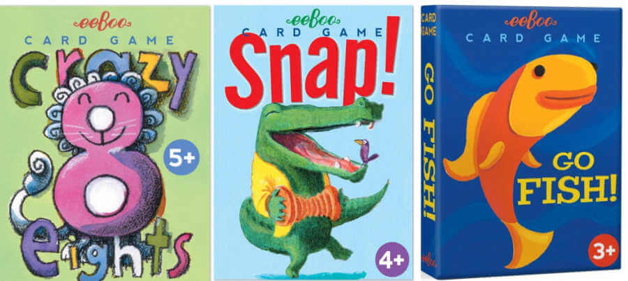 Three playing card games in boxes.