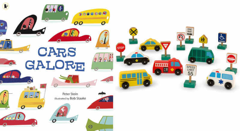 Cars Galore book next to toy vehicles and street signs.