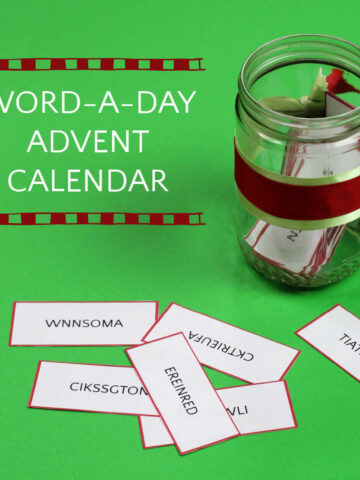 Jar tied with ribbon holding words on small slips of paper. More words on papers scattered on green background with text overlay that reads, "Word a Day Advent Calendar"