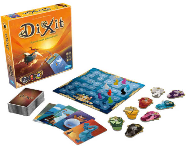 Dixit game box and set up of board, cards and game tokens.